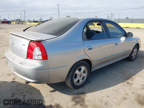 2003 Kia Spectra GS z VIN KNAFB161535095413, wystawiony jako IAAI lot #41478418 z przebiegiem 141 441 mil mil oraz . Historia ofert i sprzedaży dostępna na DreamBid. Obrazek 4.
