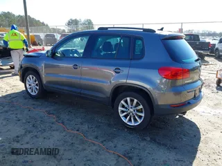 2014 Volkswagen Tiguan SE z VIN WVGAV3AX0EW511694, wystawiony jako IAAI lot #41811345 z przebiegiem 95 129 mil mil oraz . Historia ofert i sprzedaży dostępna na DreamBid. Obrazek 3.