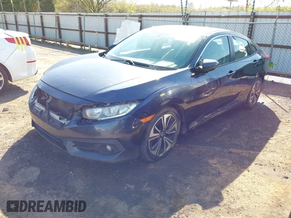 2016 Honda Civic Sedan EX-T with VIN 19XFC1F30GE025233, listed as a IAAI auction lot 41987604 with 129,311 mi miles. Bid and sale history available at carsss.com. Image 17.