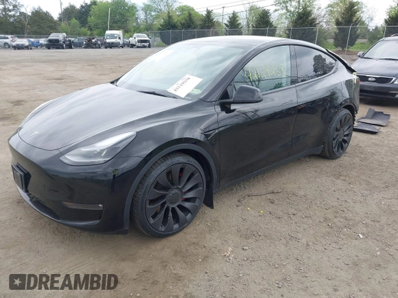 2023 Tesla Model Y Performance z VIN 7SAYGDEF7PF663387, wystawiony jako IAAI lot #42129258 z przebiegiem 42 691 mil mil oraz . Historia ofert i sprzedaży dostępna na DreamBid. Obrazek 18.