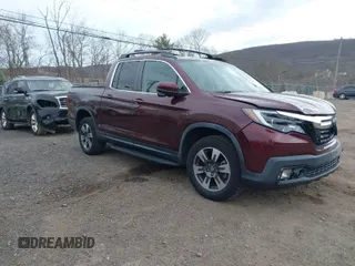 2018 Honda Ridgeline RTL-T with VIN 5FPYK3F69JB010983, listed as a IAAI auction lot 41781716 with 45,494 mi miles and . Bid and sale history available at DreamBid. Image 1.