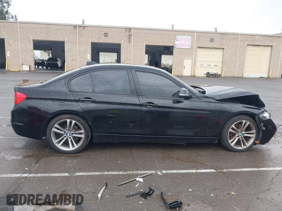 2015 BMW 3 Series 328i with VIN WBA3A5G51FNS83378, listed as a IAAI auction lot 41719392 with 114,146 mi miles. Bid and sale history available at carsss.com. Image 13.