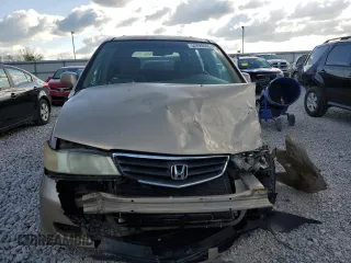 2002 Honda Odyssey EX z VIN 2HKRL18612H503328, wystawiony jako Copart lot #52699095 z przebiegiem 241 741 mil mil oraz Szkoda całkowita • Salvage title. Historia ofert i sprzedaży dostępna na DreamBid. Obrazek 5.