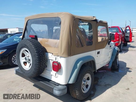 1998 Jeep Wrangler Sport z VIN 1J4FY19S3WP776209, wystawiony jako IAAI lot #42493513 z przebiegiem 113 130 mil mil oraz . Historia ofert i sprzedaży dostępna na DreamBid. Obrazek 4.