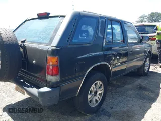1996 Isuzu Rodeo z VIN 4S2CK58V1T4342739, wystawiony jako IAAI lot #42058798 z przebiegiem 268 502 mil mil oraz . Historia ofert i sprzedaży dostępna na DreamBid. Obrazek 4.