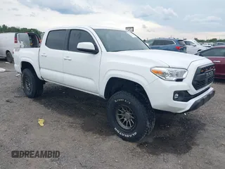 2022 Toyota Tacoma SR with VIN 3TMCZ5AN5NM506230, listed as a IAAI auction lot 42314568 with 50,315 mi miles and . Bid and sale history available at DreamBid. Image 1.