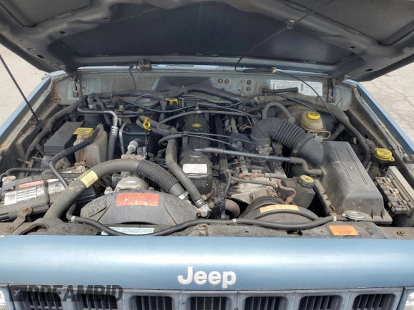 1998 Jeep Cherokee Sport with VIN 1J4FJ68S6WL215447, listed as a Copart auction lot 65186505 with 177,682 mi miles and Clean title. Bid and sale history available at DreamBid. Image 12.