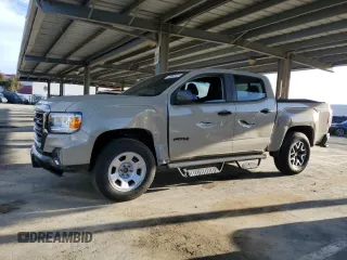 2021 GMC Canyon 4WD AT4 z VIN 1GTG6FEN3M1196116, wystawiony jako Copart lot #48063925 z przebiegiem 61 708 mil mil oraz Szkoda całkowita • Salvage title. Historia ofert i sprzedaży dostępna na DreamBid. Obrazek 1.