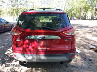 2014 Ford Escape Titanium with VIN 1FMCU9JX7EUB68165, listed as a IAAI auction lot 42141235 with 172,041 mi miles and . Bid and sale history available at DreamBid. Image 17.