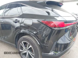 2023 Lexus RX 350 with VIN 2T2BAMBAXPC021856, listed as a IAAI auction lot 42790798 with 36,438 mi miles and . Bid and sale history available at DreamBid. Image 6.