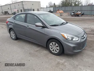 2015 Hyundai Accent GLS with VIN KMHCT4AE1FU933912, listed as a IAAI auction lot 42061338 with 166,610 mi miles. Bid and sale history available at carsss.com. Image 1.