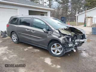 2019 Honda Odyssey EX with VIN 5FNRL6H50KB097304, listed as a IAAI auction lot 41659899 with 128,641 mi miles. Bid and sale history available at carsss.com. Image 1.
