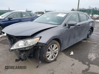 2014 Lexus ES 330 with VIN JTHBK1GG0E2113100, listed as a IAAI auction lot 41309816 with 233,535 mi miles and . Bid and sale history available at DreamBid. Image 2.