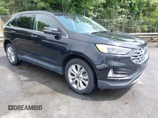 2019 Ford Edge Titanium z VIN 2FMPK3K97KBC02157, wystawiony jako IAAI lot #42232212 z przebiegiem 105 814 mil mil oraz . Historia ofert i sprzedaży dostępna na DreamBid. Obrazek 1.