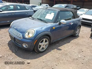 2009 MINI Convertible с VIN WMWMR33569TJ93991, выставлен на аукционе IAAI как лот 42382783 с пробегом Не указан миль и . История ставок и продаж доступна на DreamBid. Изображение 2.