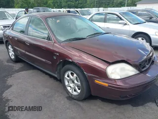 2000 Mercury Sable LS Premium Group z VIN 1MEFM53S7YA620230, wystawiony jako IAAI lot #42262407 z przebiegiem 288 274 mil mil oraz . Historia ofert i sprzedaży dostępna na DreamBid. Obrazek 1.