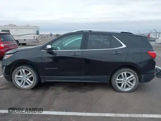 2021 Chevrolet Equinox Premier z VIN 2GNAXXEV4M6118442, wystawiony jako IAAI lot #41392148 z przebiegiem 92 170 mil mil oraz . Historia ofert i sprzedaży dostępna na DreamBid. Obrazek 15.