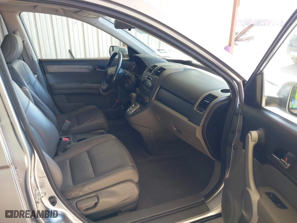 2007 Honda CR-V EX-L with VIN JHLRE387X7C069804, listed as a IAAI auction lot 41616256 with 136,271 mi miles. Bid and sale history available at carsss.com. Image 5.