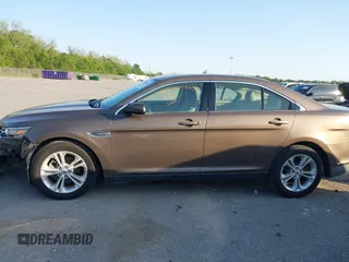 2015 Ford Taurus SEL z VIN 1FAHP2E84FG125243, wystawiony jako IAAI lot #42045847 z przebiegiem 42 093 mil mil oraz . Historia ofert i sprzedaży dostępna na DreamBid. Obrazek 14.