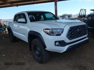 2023 Toyota Tacoma 4WD SR with VIN 3TMCZ5AN8PM650793, listed as a IAAI auction lot 41664712 with 9,427 mi miles. Bid and sale history available at carsss.com. Image 1.