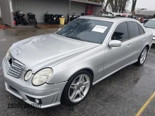 2003 Mercedes-Benz E-Class 5.5L AMG with VIN WDBUF76J93A351317, listed as a IAAI auction lot 41573446 with 144,119 mi miles. Bid and sale history available at carsss.com. Image 17.
