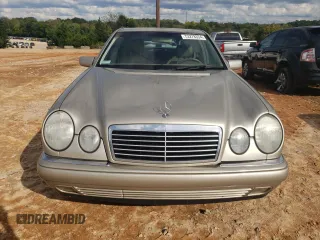 1999 Mercedes-Benz E-Class with VIN WDBJF65HXXA891437, listed as a Copart auction lot 73278334 with 197,159 mi miles and Salvage Title. Bid and sale history available at carsss.com. Image 5.