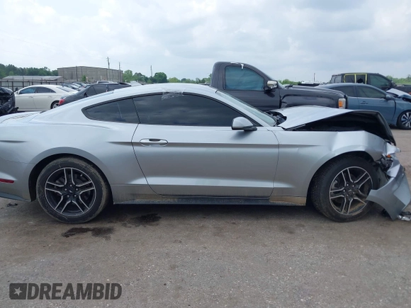 2020 Ford Mustang EcoBoost z VIN 1FA6P8TH2L5186210, wystawiony jako IAAI lot #42103657 z przebiegiem 68 790 mil mil oraz . Historia ofert i sprzedaży dostępna na DreamBid. Obrazek 14.