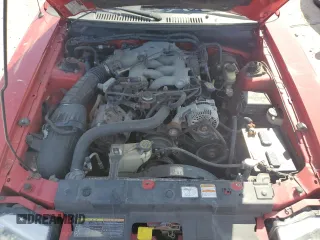 1999 Ford Mustang z VIN 1FAFP4443XF106725, wystawiony jako Copart lot #77011284 z przebiegiem Nie podano mil oraz Szkoda całkowita • Salvage title. Historia ofert i sprzedaży dostępna na DreamBid. Obrazek 11.