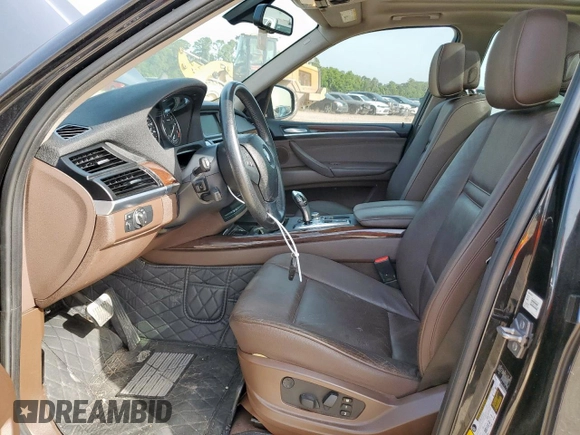 2012 BMW X5 35i with VIN 5UXZV4C54CL754852, listed as a Copart auction lot 62836055 with 108,627 mi miles and Clean title. Bid and sale history available at DreamBid. Image 7.
