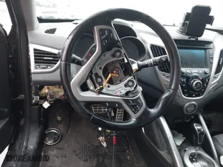 2015 Hyundai Veloster RE:FLEX with VIN KMHTC6AD2FU229849, listed as a IAAI auction lot 41705641 with 170,591 mi miles. Bid and sale history available at carsss.com. Image 13.