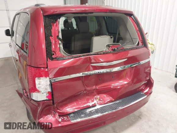 2015 Chrysler Town & Country Limited Platinum with VIN 2C4RC1GGXFR597180, listed as a IAAI auction lot 41374817 with 90,088 mi miles and . Bid and sale history available at DreamBid. Image 6.