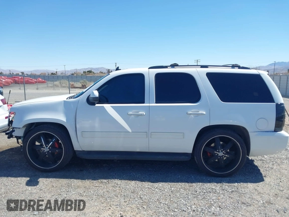 2012 Chevrolet Tahoe LS with VIN 1GNSCAE06CR141256, listed as a IAAI auction lot 41806708 with 105,984 mi miles and . Bid and sale history available at DreamBid. Image 14.