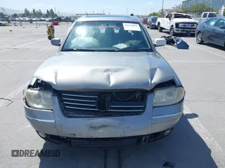 2003 Volkswagen Passat GLS z VIN WVWPD63B93P045100, wystawiony jako IAAI lot #42349064 z przebiegiem 173 929 mil mil oraz . Historia ofert i sprzedaży dostępna na DreamBid. Obrazek 12.