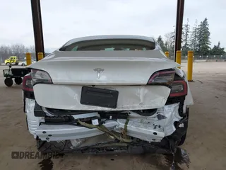 2023 Tesla Model 3 z VIN 5YJ3E1EA8PF412166, wystawiony jako IAAI lot #41461983 z przebiegiem 25 908 mil mil oraz . Historia ofert i sprzedaży dostępna na DreamBid. Obrazek 16.