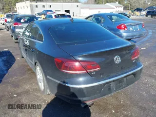 2013 Volkswagen CC Sport with VIN WVWBP7AN9DE565587, listed as a IAAI auction lot 41739505 with 167,319 mi miles. Bid and sale history available at carsss.com. Image 3.
