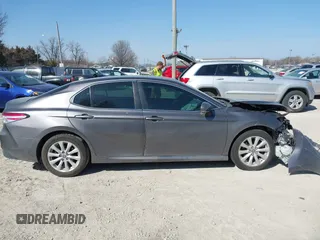 2019 Toyota Camry LE with VIN 4T1B11HK9KU810347, listed as a IAAI auction lot 41804007 with 75,063 mi miles and . Bid and sale history available at DreamBid. Image 14.