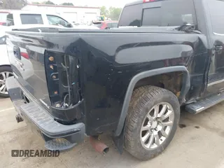 2014 GMC Sierra 1500 Denali z VIN 3GTU2WEJ0EG319322, wystawiony jako IAAI lot #41947884 z przebiegiem 216 063 mil mil oraz . Historia ofert i sprzedaży dostępna na DreamBid. Obrazek 12.