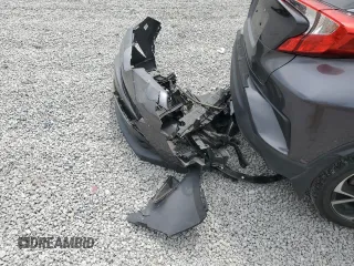 2018 Toyota C-HR XLE z VIN JTNKHMBX2J1011026, wystawiony jako Copart lot #54720135 z przebiegiem 63 614 mil mil oraz Szkoda całkowita • Salvage title. Historia ofert i sprzedaży dostępna na DreamBid. Obrazek 12.