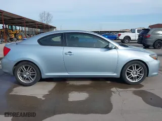 2006 Scion tC with VIN JTKDE167060103157, listed as a IAAI auction lot 41867710 with 221,441 mi miles. Bid and sale history available at carsss.com. Image 14.