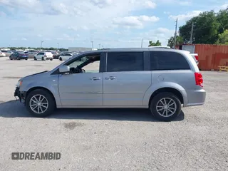 2014 Dodge Grand Caravan SXT with VIN 2C4RDGCG3ER193688, listed as a IAAI auction lot 41290544 with 73,092 mi miles and . Bid and sale history available at DreamBid. Image 15.