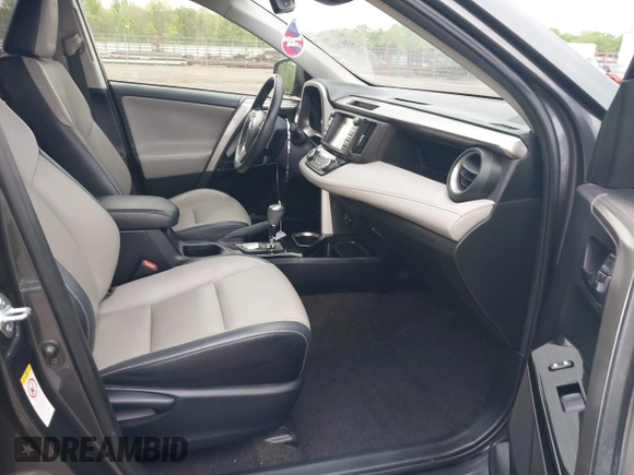 2017 Toyota RAV4 Hybrid Limited with VIN JTMDJREV8HD144858, listed as a IAAI auction lot 42092847 with 135,046 mi miles. Bid and sale history available at carsss.com. Image 5.
