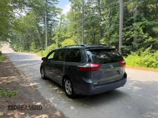 2015 Toyota Sienna LE AAS with VIN 5TDKK3DC1FS623710, listed as a Copart auction lot 62335575 with 221,148 mi miles and Clean title. Bid and sale history available at DreamBid. Image 3.