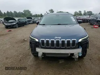 2019 Jeep Cherokee Latitude with VIN 1C4PJLCB9KD412004, listed as a Copart auction lot 61642015 with 121,336 mi miles and Salvage title. Bid and sale history available at DreamBid. Image 14.
