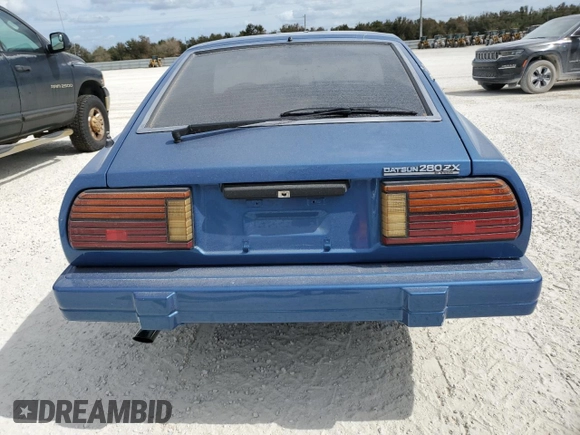 1982 Datsun 280ZX z VIN JN1HZ04S5CX457910, wystawiony jako Copart lot #77132604 z przebiegiem 261 383 mil mil oraz Szkody całkowita. Historia ofert i sprzedaży dostępna na DreamBid. Obrazek 6.