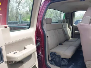 2005 Ford F-150 XLT with VIN 1FTPX14575KD79404, listed as a IAAI auction lot 42003073 with 212,050 mi miles. Bid and sale history available at carsss.com. Image 8.