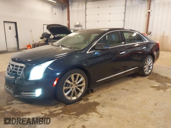 2014 Cadillac XTS Luxury with VIN 2G61M5S39E9325923, listed as a IAAI auction lot 41253343 with 69,319 mi miles. Bid and sale history available at carsss.com. Image 2.