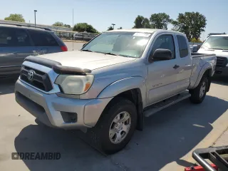 2014 Toyota Tacoma PreRunner with VIN 5TFTX4GN6EX028255, listed as a Copart auction lot 62890915 with 306,908 mi miles and Salvage title. Bid and sale history available at DreamBid. Image 1.