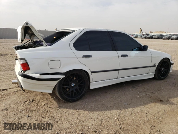 1997 BMW 3 Series 318i with VIN WBACC932XVEE56975, listed as a Copart auction lot 78348114 with 169,666 mi miles and Salvage Title. Bid and sale history available at carsss.com. Image 3.