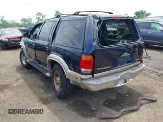 2001 Ford Explorer Eddie Bauer z VIN 1FMZU74E01ZA15102, wystawiony jako IAAI lot #42296412 z przebiegiem 163 954 mil mil oraz . Historia ofert i sprzedaży dostępna na DreamBid. Obrazek 3.