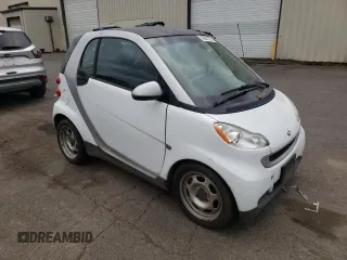 2012 Smart fortwo Pure с VIN WMEEJ3BA1CK573090, выставлен на аукционе Copart как лот 59881025 с пробегом 128 086 миль миль и Чистый • Clean title. История ставок и продаж доступна на DreamBid. Изображение 4.